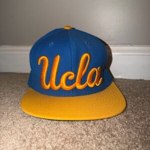 Mitchell and Ness UCLA Blue and Gold Script Snapback Hat